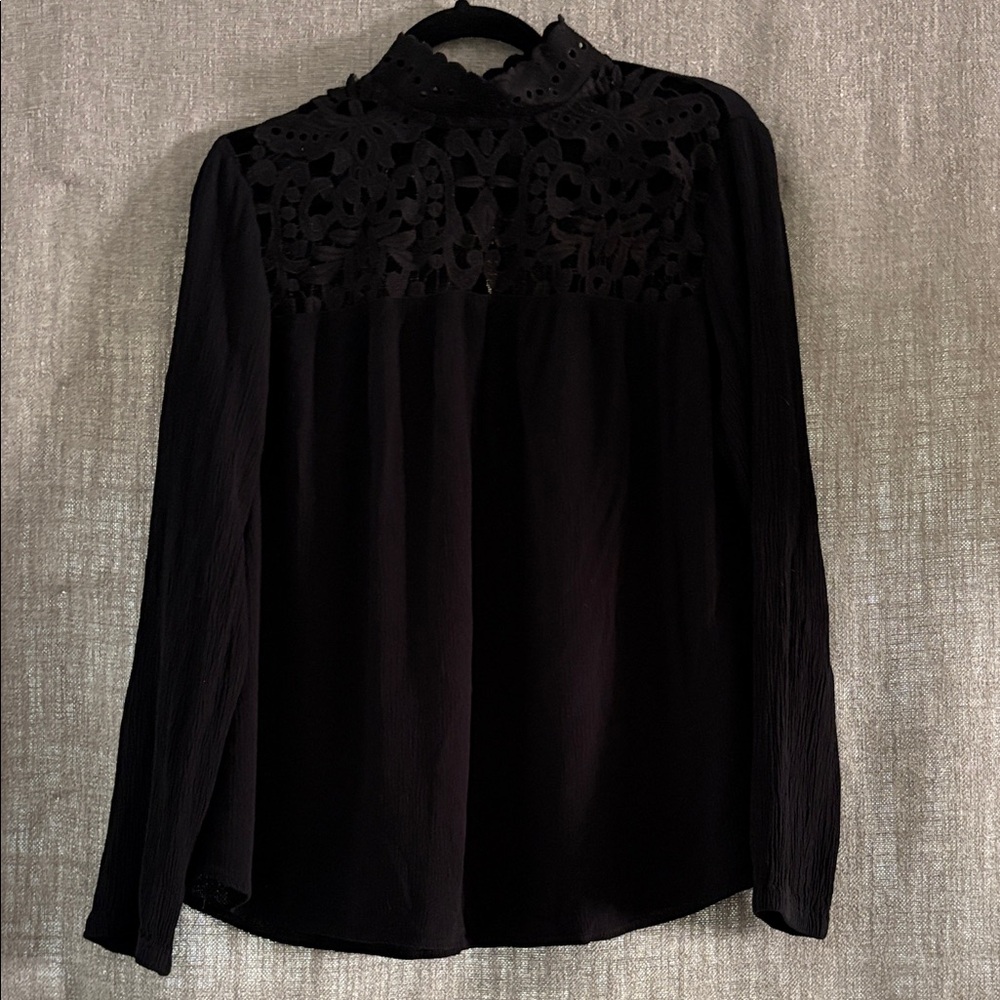 Vintage style high neck lace blouse w/ sexy crochet lace detail.